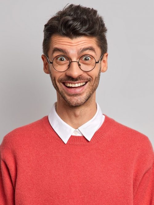 isolated-shot-of-cheerful-european-man-with-bristle-smiles-gladfully-happy-to-hear-good-news-wears-r-e1627313661782.jpg